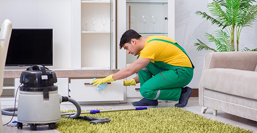 professional cleaning contractor working home